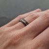 Baller. Mens Black and Rose Gold Multi Faceted Wedding Band