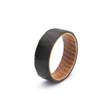 geometric pattern mens wedding ring with oak wood sleeve side view